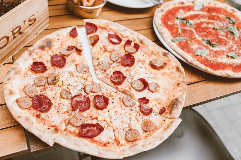 Spicy Meat Lovers dions pizza with multiple toppings